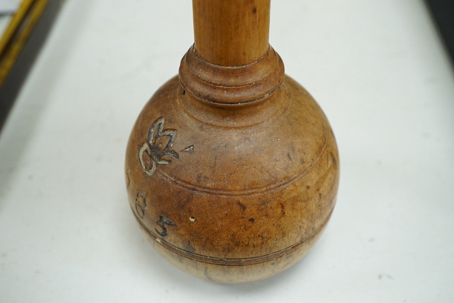 An 18th century French fruitwood weight/measure, 73cm. Condition - fair to good